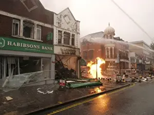 Explosions Prints: Firefighters at the scene of an explosion