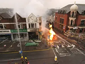 Firefighters at the scene of an explosion