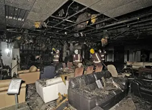 Firefighters at the scene of a fire in a furniture shop