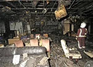 Cricklewood Prints: Firefighters at the scene of a fire in a furniture shop