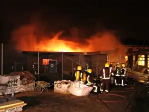 Firefighters at scene of fire, Langley Park School