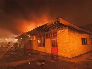 Firefighters at scene of fire, Langley Park School