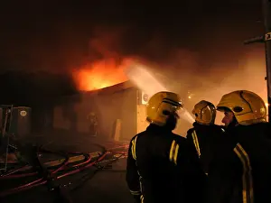 Firefighters at scene of fire, Langley Park School