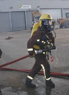 Firefighters at scene of fire at Staples Corner