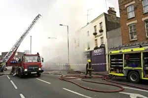 Firefighters at scene of fire, Stockwell Road, Brixton