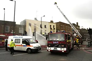 Firefighters at scene of fire, Stockwell Road, Brixton