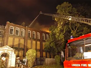 Firefighters at the scene of a school fire, SE London