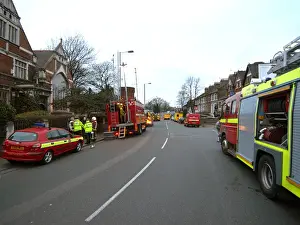 Firefighters at the scene of a warehouse fire, SE London
