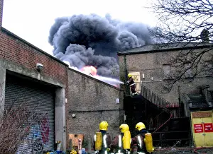 Premises Prints: Firefighters at the scene of a warehouse fire, SE London