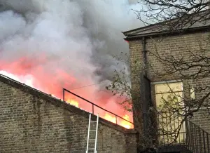 Firefighters at the scene of a warehouse fire, SE London
