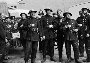 Hats Gallery: Firefighters on a tea break after fire St Katherines Dock