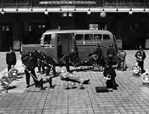 Firefighters in training with various equipment