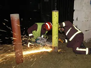 Reflective Prints: Firefighters using cutting equipment, SE London