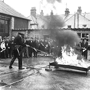 Spraying Prints: Firefighting demonstration at a school in Eastbourne