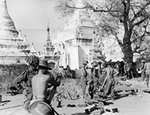 Firing mortars over pagodas at Meiktila, Burma