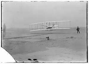 First flight, 120 feet in 12 seconds, 10: 35 a. m. ; Kitty Hawk