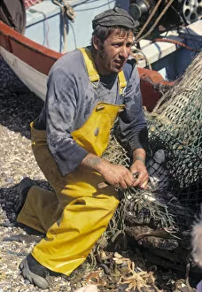 Pebble Gallery: Fisherman Opening Nets, Aldeburgh
