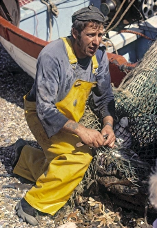 Pebble Gallery: Fisherman Opening Nets, Aldeburgh