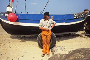 Beached Prints: Fisherman waits for tide, Happisburgh, Norfolk