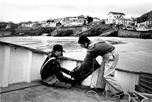 Lobster Prints: Fishermen bait a lobster pot, Newquay, Wales