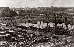Barrels Collection: Fishing boats and barrels in the harbour at Wick, Scotland