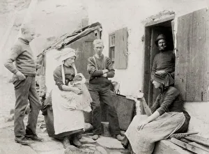 Fishing family outside their cottage, Staithes, Yorkshire