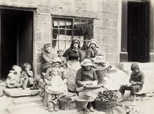 Parent Prints: Fishing family outside their home in Staithes Yorkshire