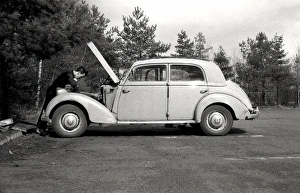 Images Dated 15th February 2011: Fixing a car
