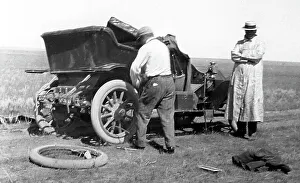 Fixing a puncture, early 1900s