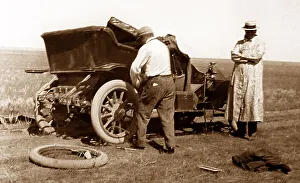 Fixing a puncture, early 1900s