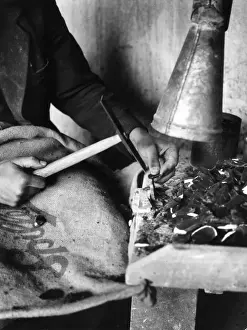 The Flint Knapper, at Brandon, Suffolk, England. This ancient craft is still continued