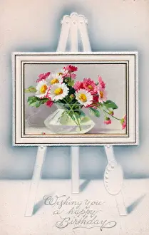 Flowers in a vase on an easel on a birthday postcard