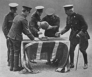 Neville Prints: Football dribbled by the East Surreys to German trench, WW1