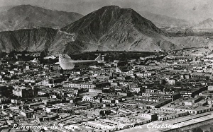 Cristobal Collection: A Ford Panagra plane flies over Lima, Peru