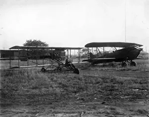 Glenn Prints: Foreground: A replica of a 1912-style Curtiss pusher