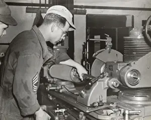 Erding Prints: A Foreman and an Airman Check a Grinding Machine at the ?