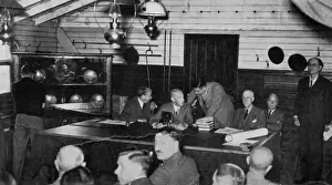 The foreman of the jury conferring with the Coroner in Sutton village hall where a