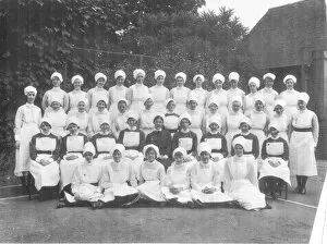 Kearsley Collection: Formal group of matron, nurses and sister outdoors