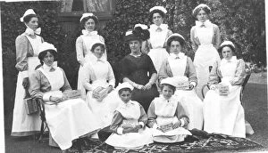 Images Dated 19th October 2017: Formal group of ten nurses with collecting boxes, and lady