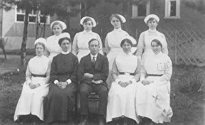 Nursing Gallery: Formal group photograph, six nurses, senior nurse, gentlema