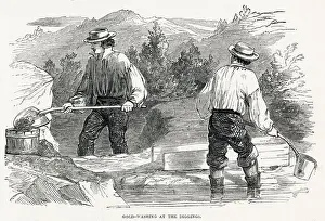 Two fortune seekers, one man shovelling up washed up dirty water into a cradle