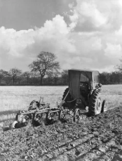Images Dated 17th May 2011: Four-Furrow Tractor