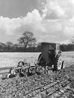 Images Dated 17th May 2011: Four-Furrow Tractor