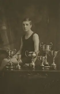 Fourteen Prints: Fourteen year old swimming champion with trophies