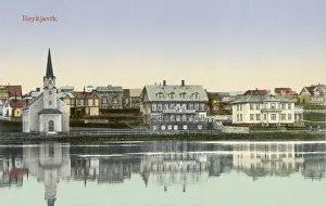 Shores Prints: Free church at the waterside of Lake Tjornin, Iceland