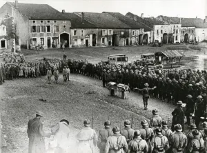 Solemn Prints: French and American soldiers at a military funeral, WW1