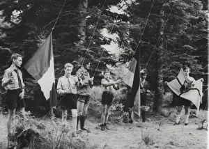 Clearing Prints: French boy scouts at camp with flags
