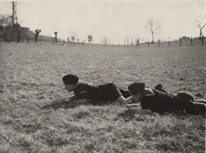 Crawling Prints: French cub scouts in a field