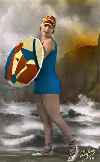 Beachwear Prints: French girl in swimwear, carrying a colouful parasol