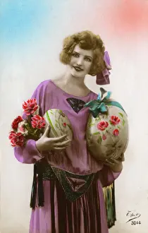 Sizeable Prints: French model holding two large Easter eggs
